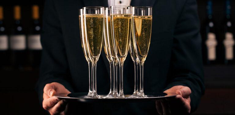 chamapgne flutes on a tray